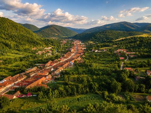 an aerial view of a small town in the mountains at Casa Dives - Varianta Boierească in Pianu de Sus