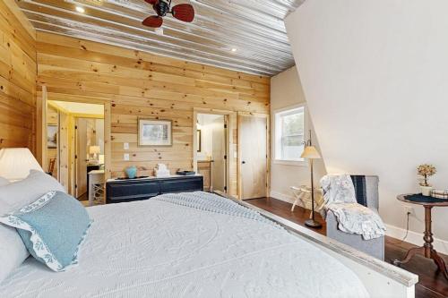 a bedroom with a large bed and a bathroom at Valley Vista Vacay 2 in Littleton