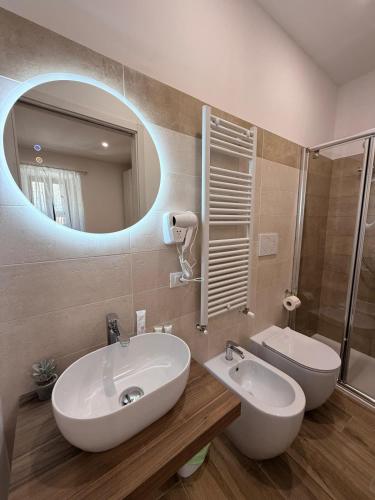 a bathroom with a sink and a mirror at Casa Ma&Emy in Roccaporena