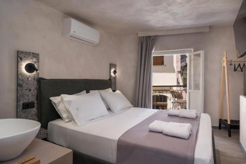 CAVO III Luxury Boutique Rooms