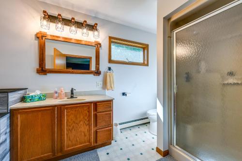 a bathroom with a sink and a shower at Wooded Applegate Retreat w/ Private Trail Access in Applegate
