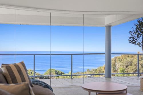 a living room with a view of the ocean at Ultimate Ocean Views - Pet Friendly in Bellbrae
