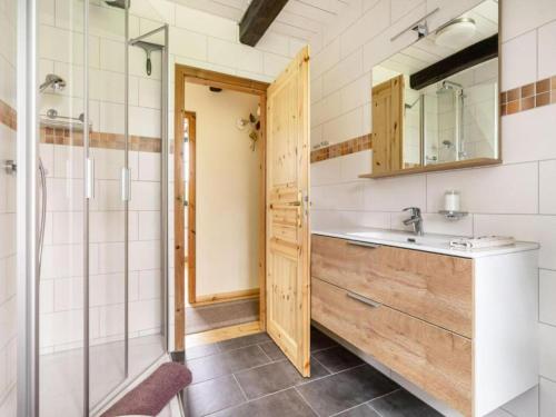 a bathroom with a sink and a shower at Alma in Zierow