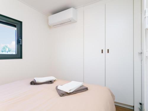 เตียงในห้องที่ Lymaris
