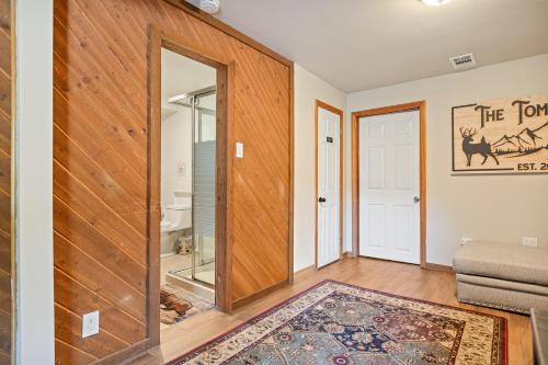 a living room with a sliding glass door at SPSL Lake Arrowhead llc in Lake Arrowhead