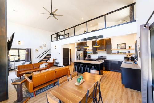 an open living room and kitchen with orange furniture at Flint Ridge in Sister Bay