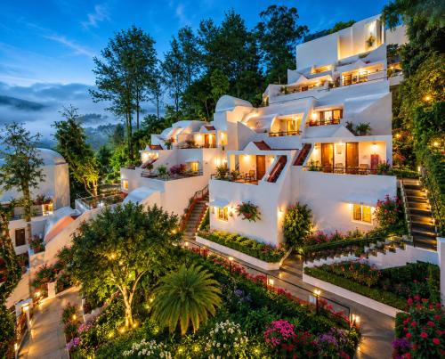 an aerial view of a white building with lights at Sterling Yercaud in Yercaud