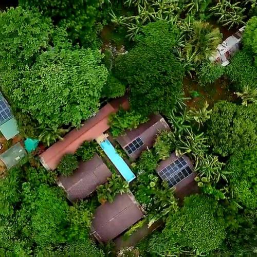 an overhead view of a group of houses and trees at At Home in Puerto Princesa City