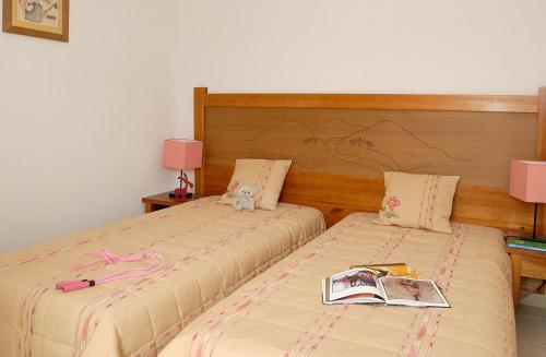 Postel nebo postele na pokoji v ubytování Madame Vacances - Résidence La Marquisié