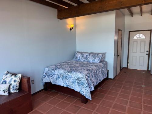 a bedroom with a bed in a room at Campo Rivera Beach Community in La Misión
