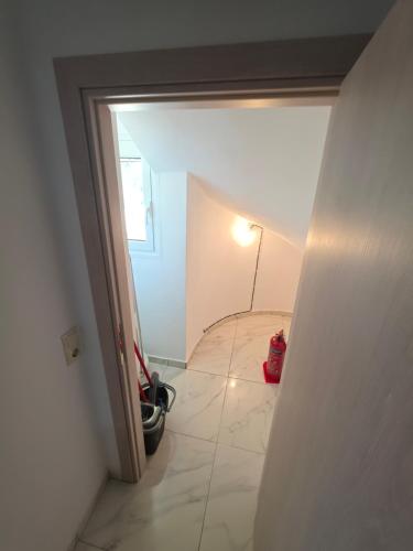 a view of a hallway with a room with a room at Garyfallia's House in Korifásion