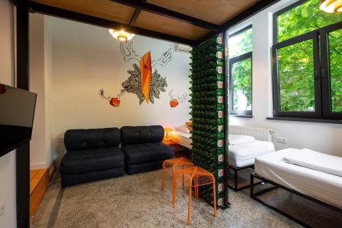 a living room with a couch and a table at Boutique Apartments Possonium in Bratislava