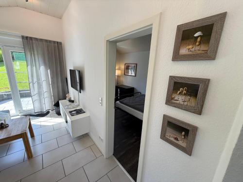 a room with a living room with a fireplace at Ferienhaus Burbach in Burbach