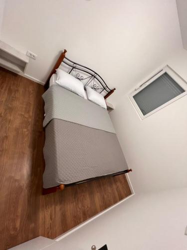 an overhead view of a bed in a room at Green View in Petrovaradin