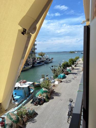 a view of a harbor with boats in the water at AdryHouse in Grado