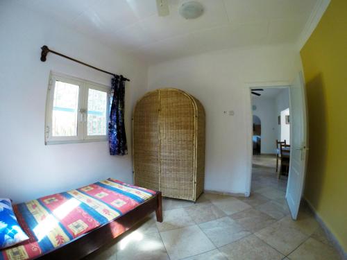 Letto o letti in una camera di Sanchaba Yellow Apartments