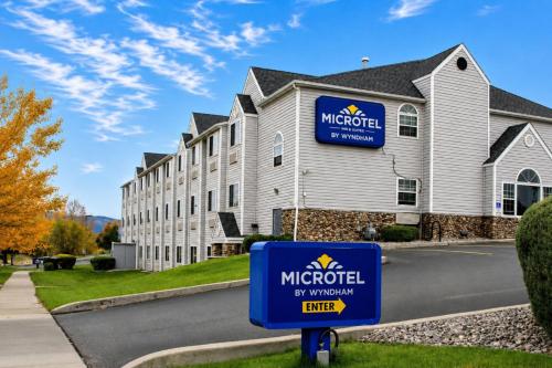 a hospital sign in front of a building at Microtel Inn & Suites by Wyndham Bozeman in Bozeman