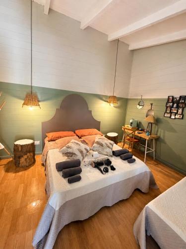 a bedroom with a large bed in a room at La Collina Dei Castagni in Terni