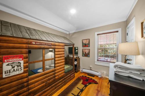 a room with a large wooden room with a dog house at Four Bear Falls in Banner Elk