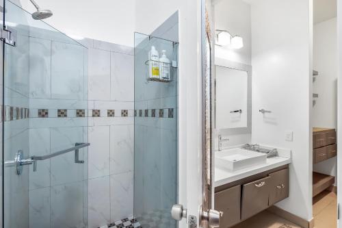 a bathroom with a shower and a sink at Dog-Friendly Ocean-view Villa with Patio, Outdoor Pool, Streaming, partial AC in Rosarito