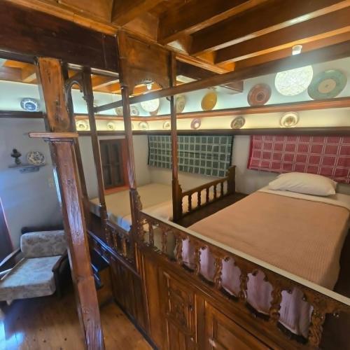 an overhead view of a boat with two bunk beds at The Relic in Olympos
