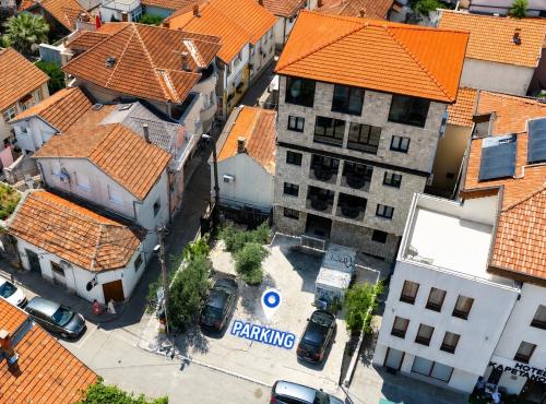an overhead view of a city with orange roofs at Villa Anri in Mostar