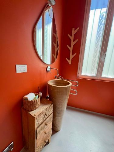 a bathroom with a sink and a mirror at Villa Martina Luxury Suites Como Lake in Lecco