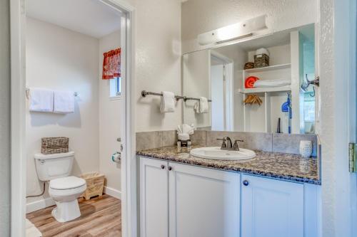 a bathroom with a sink and a toilet at Neskowin Resort 114 in Neskowin