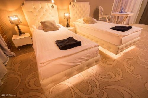 Hotel Ramka & Restaurant & Wine Barにあるベッド