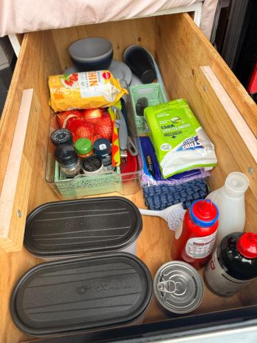 a drawer filled with food and other items at Caddy Car in Brisbane