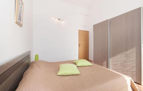 Łóżko lub łóżka w pokoju w obiekcie Villa Kontesici 12