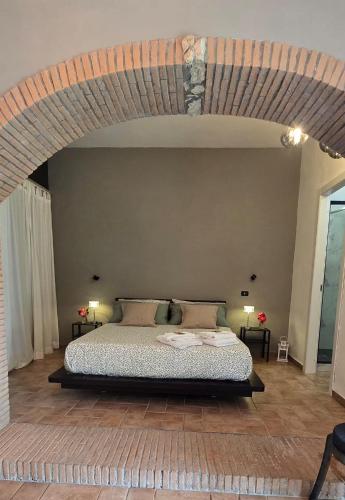 a bedroom with a bed in a room at A Casa di Dody in Guidonia