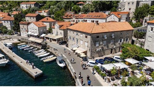 an aerial view of a marina with boats in the water at Serenity Sea in Perast