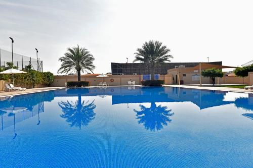Bazén v ubytování Jannah Hotel Apartments & Villas nebo v jeho okolí