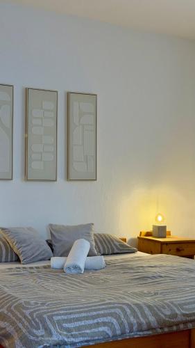 a bedroom with a large bed with two pillows at HollidayVillage 5B in Matka Božia