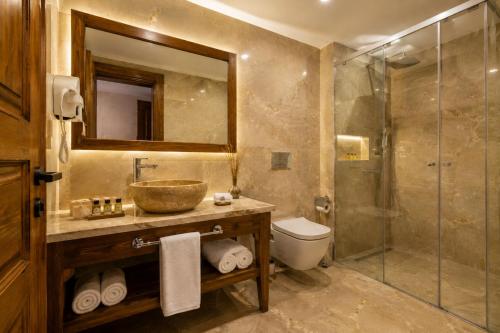 a bathroom with a sink and a shower at Mai Cappadocia in Göreme