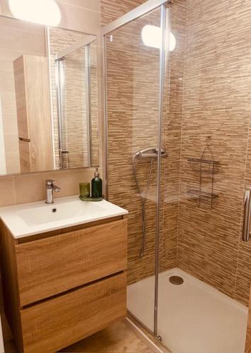 a bathroom with a shower and a sink and a shower at Blue Riviera in Roquebrune-Cap-Martin