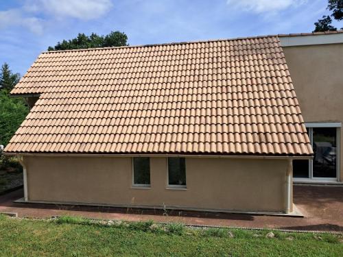 a house with an orange tile roof at La Châtelaine in Lombez