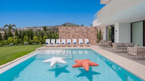 VACATION MARBELLA I Villa Trophy, Built in 2026, Private Turquoise Pool, 6BDR, Walking Distance to Los Naranjos, Minutes from Puerto Banus, Luxury Interiors, Private GYM, Lounge Bar