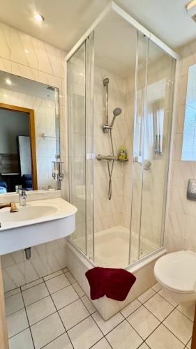 Ванная комната в Hotel Pension Pamina