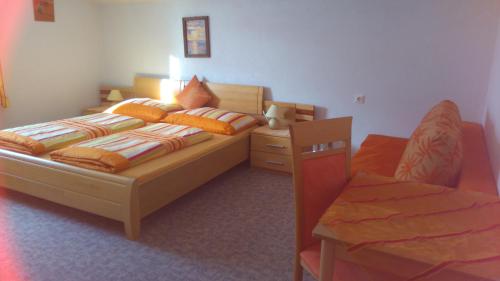 Posteľ alebo postele v izbe v ubytovaní Ferienwohnungen Egger