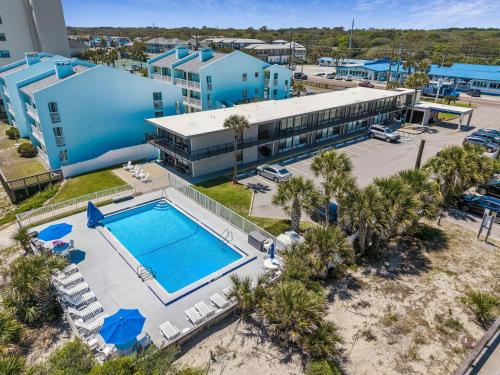 an aerial view of a resort with a swimming pool at Beachside Motel - Amelia Island in Amelia Island