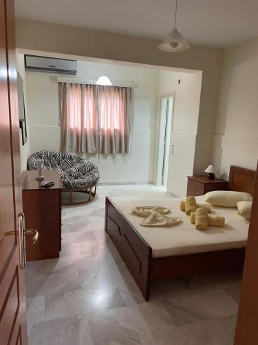 a bedroom with a large bed in a room at Villa Lagosta in Város