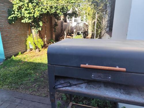 a close up of a grill in a yard at Cocina Bajo las Estrellas in Martínez