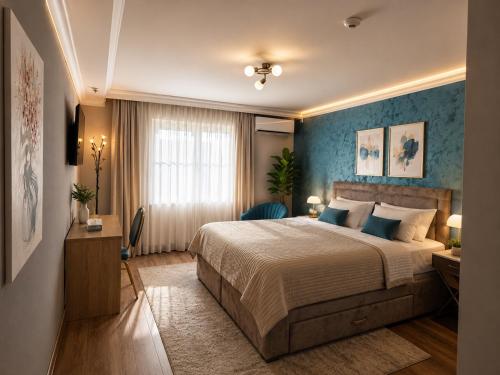 a hotel room with a bed and a window at Vila Kristina in Negotin