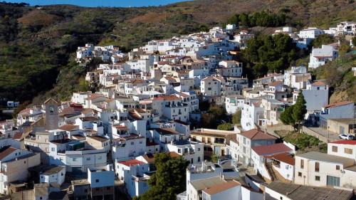 an aerial view of a village with white houses at Casa Amigos Sorvilan - Limón in Sorvilán