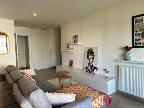 T3 2 chambres avec balcon et place de stationnement