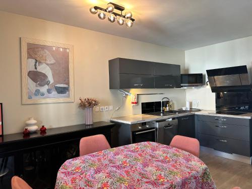 T3 2 chambres avec balcon et place de stationnement