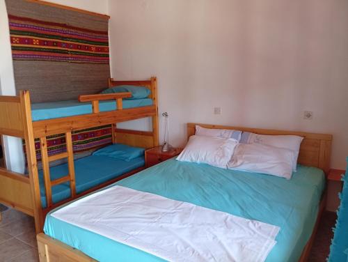 Postel nebo postele na pokoji v ubytování Vaso Studios