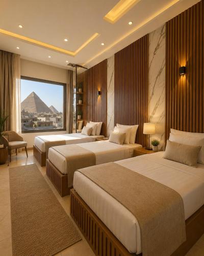 a hotel room with two beds and a pyramid at Lava pyramids hotel in Cairo